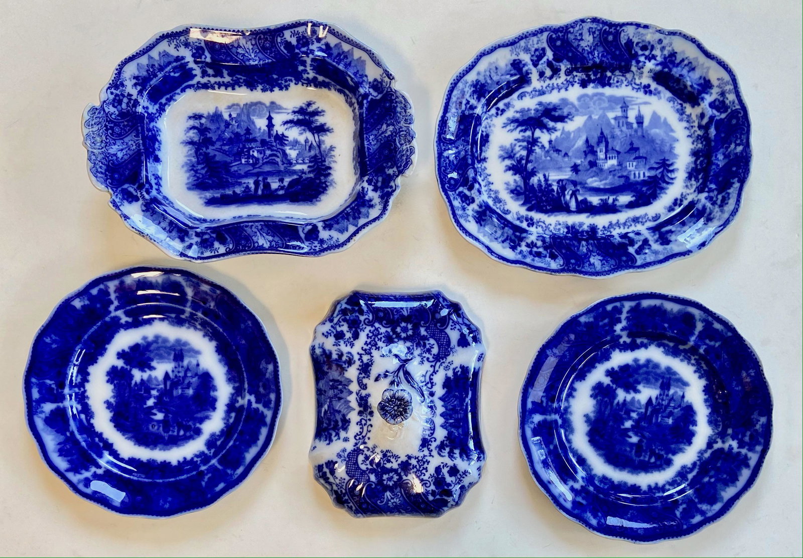 Middleport Flow Blue Burgess & Leigh Pottery, England 1890s: Antique 19th Century English Burgess and Leigh Nonpareil Flow Blue Middleport Pottery Dinnerware. Circa: 1890s. Flow Blue covered footed vegetable dish with floral knob, Nonpareil patern by Burgess Le