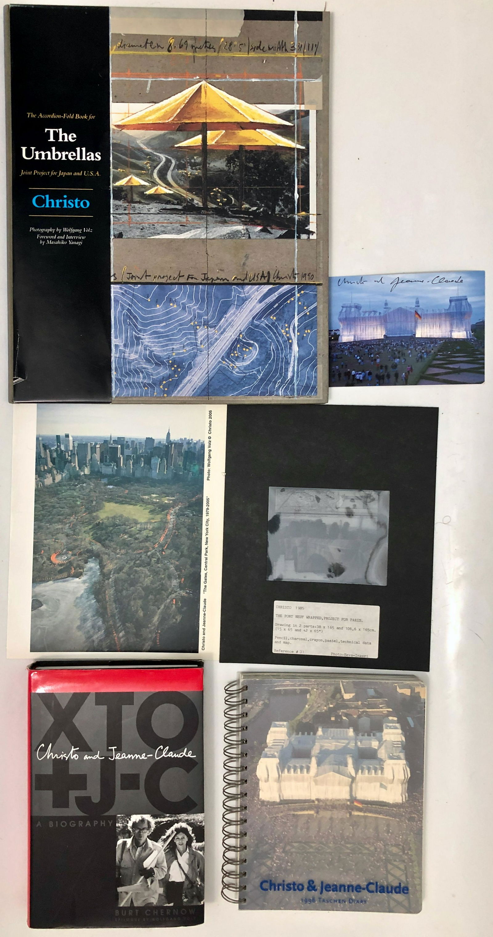 Artists Christo & Jeanne-Claude Autographed & Inscribed Books: Collection of original autographed and inscribed hand-signed books by the artists: Christo and Jeanne-Claude. Book: THE UMBRELLAS, autographed, Christo & Jeanne Claude. Book: Christo and Jean Claude,