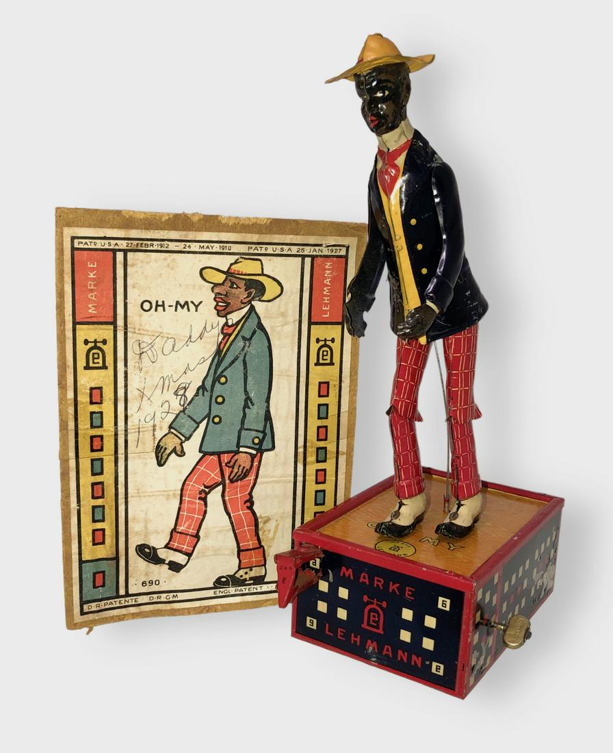 Lehmann OH MY Mechanical German Lithograph Tin Toy w/ Box, 1920s: OH MY. Black Americana Tin Lithographed and Hand Painted Windup Toy. Manufactured by Ernest Lehmann Co. of Brandenburh, Germany. Rare early version known as EPL 685 (EPL 685 version was produced from
