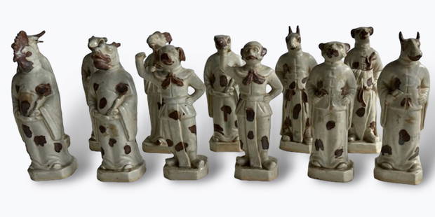 Chinese Set of Twelve Zodiac Anthropo-Zoomorphic Figures: Complete set of twelve glazed pottery zodiac figures. Represents the Chinese twelve-year cycle in which each year is associated with a specific animal. Zoomorphic figures dressed in long tunics, hands