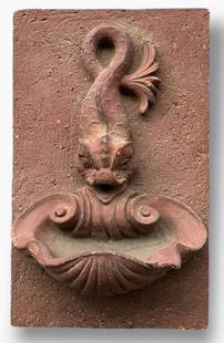 Terra-Cotta Wall Mounted Garden Dolphin Fountain  With Shell Bowl: Architectural Garden Element. Antique Wall Mounted Terra-Cotta Garden Fountain. Image: Dolphin above a Shell Form Bowl. Approximate dimensions: H: 19.6 in, W: 12 in., D: 9 1/2 in. Condition: good over