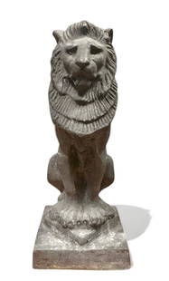 English Cast Lead Sejant Lion Garden Statue: Vintage English Cast Lead Lion Sejant Seated Garden Statue. Marked on underside: MADE IN ENGLAND. Original model was created by Alfred Stevens, England, ca. 1852. Approximate dimensions: height: 14 3/