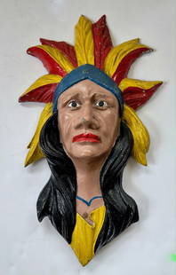 Molded Zinc Polychrome-Painted Native American Indian Head Carousel Shield Mount, 1930s: Amusement Park Indian Chief Head Carousel Shield Mount. Circa 1930s. Original relief molded zinc polychrome-painted Indian head carousel mount in half round. Attributed to Allan Herschell Co., North T