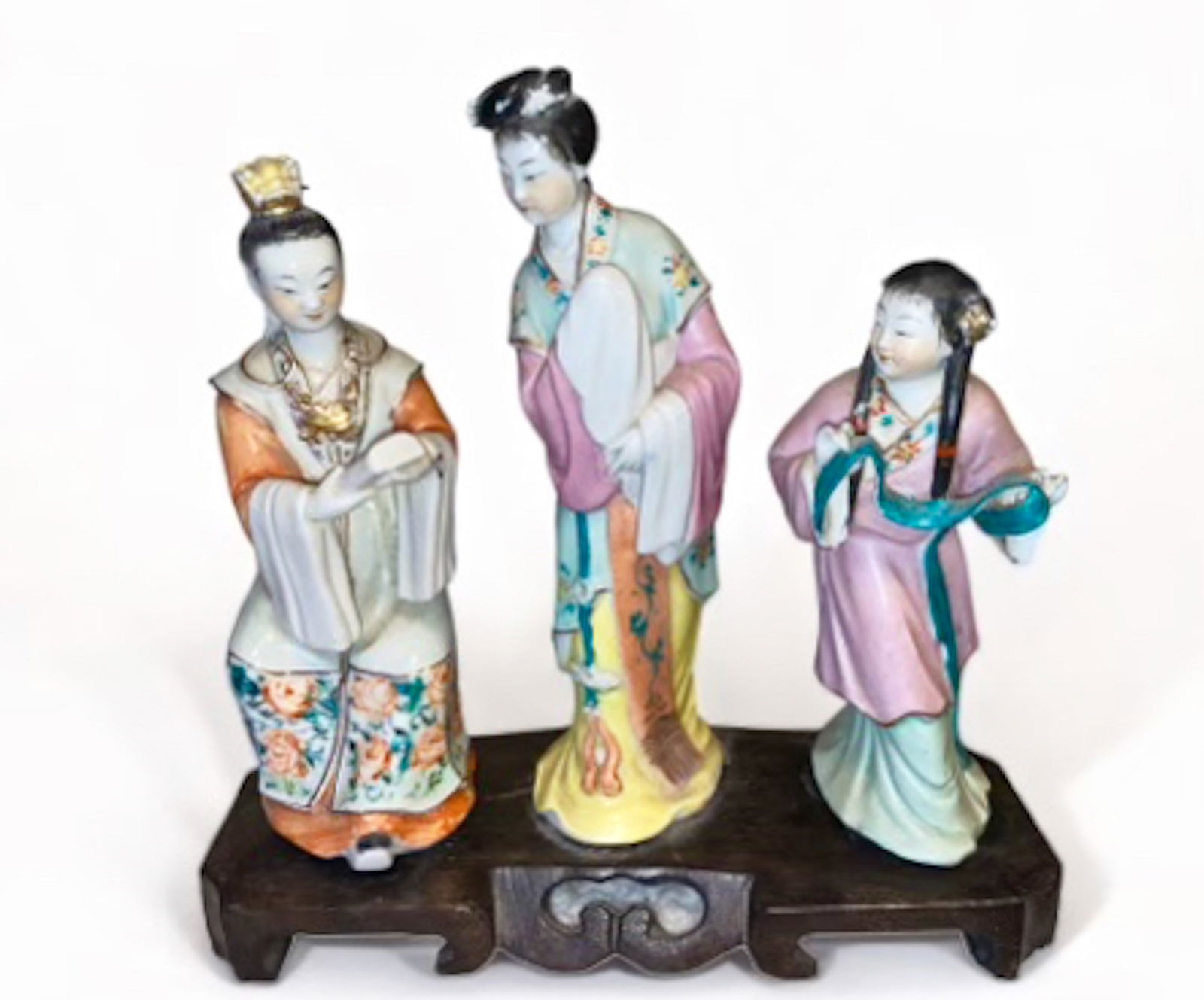 Antique Chinese Famille-Rose Porcelain Court Ladies (3): Chinese Antique Porcelain Famille-Rose Porcelain Painted Court Figures. Collection of three noble ladies mounted on a custom hardwood stand. Approximate dimensions: Seated figure height: 6 inches. Cen