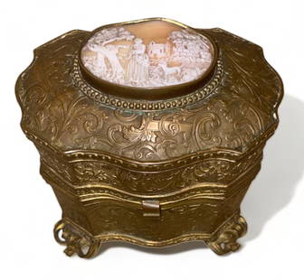 19th Century Victorian Bronze Shell Cameo Jewelry Casket Box: 19th Century Victorian Mourning Bronze Shell Cameo Jewelry Casket Box. Hand Carved shell cameo mounted on a chased foliated scroll and heart bronze box. Carved shell cameo depicts a woman and dog near