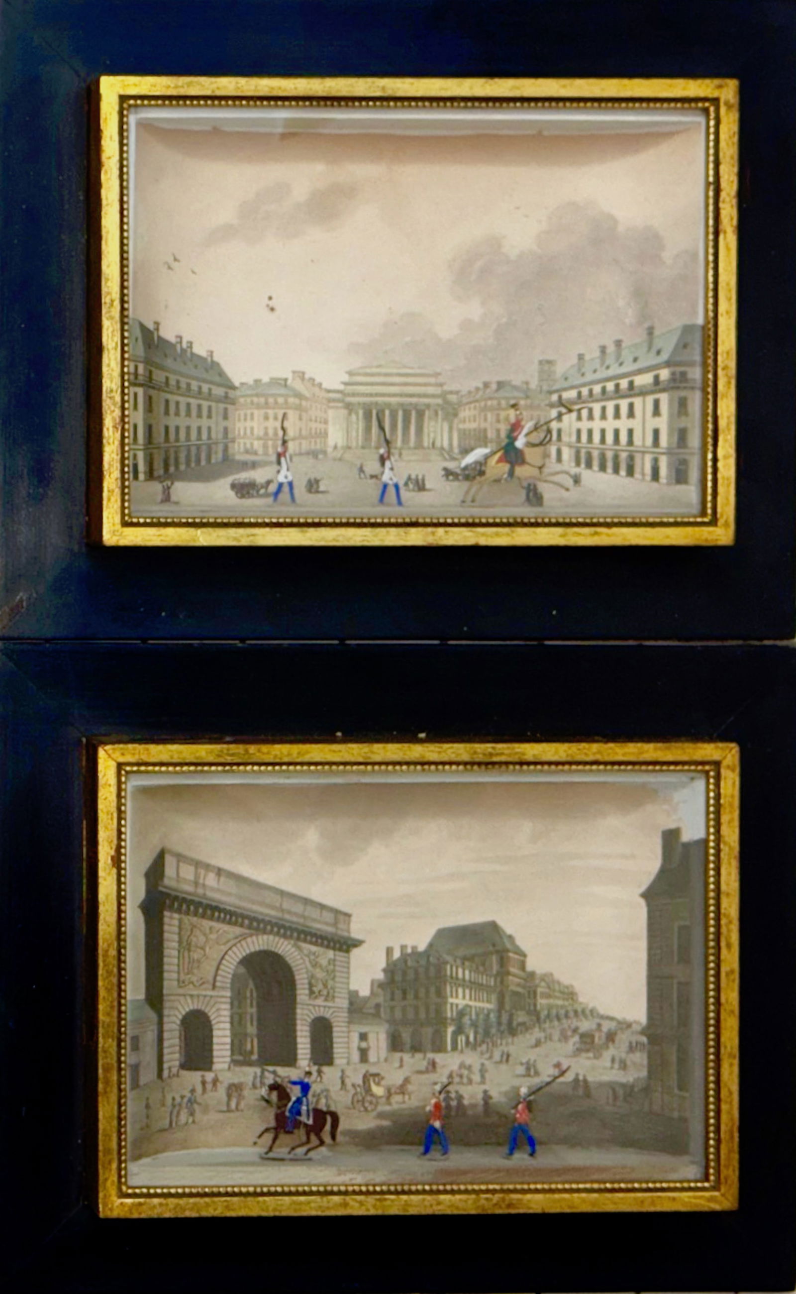 19th Century French Shadowbox Dioramas W/ Painted Metal Equestrian Soldiers: 19th Century French Shadowbox Dioramas. Pair of hand-colored copper plate engraving mounted to panel with painted metal soldiers in the foreground. Titles on verso. 1) Theatre de la Porte Saint Martin