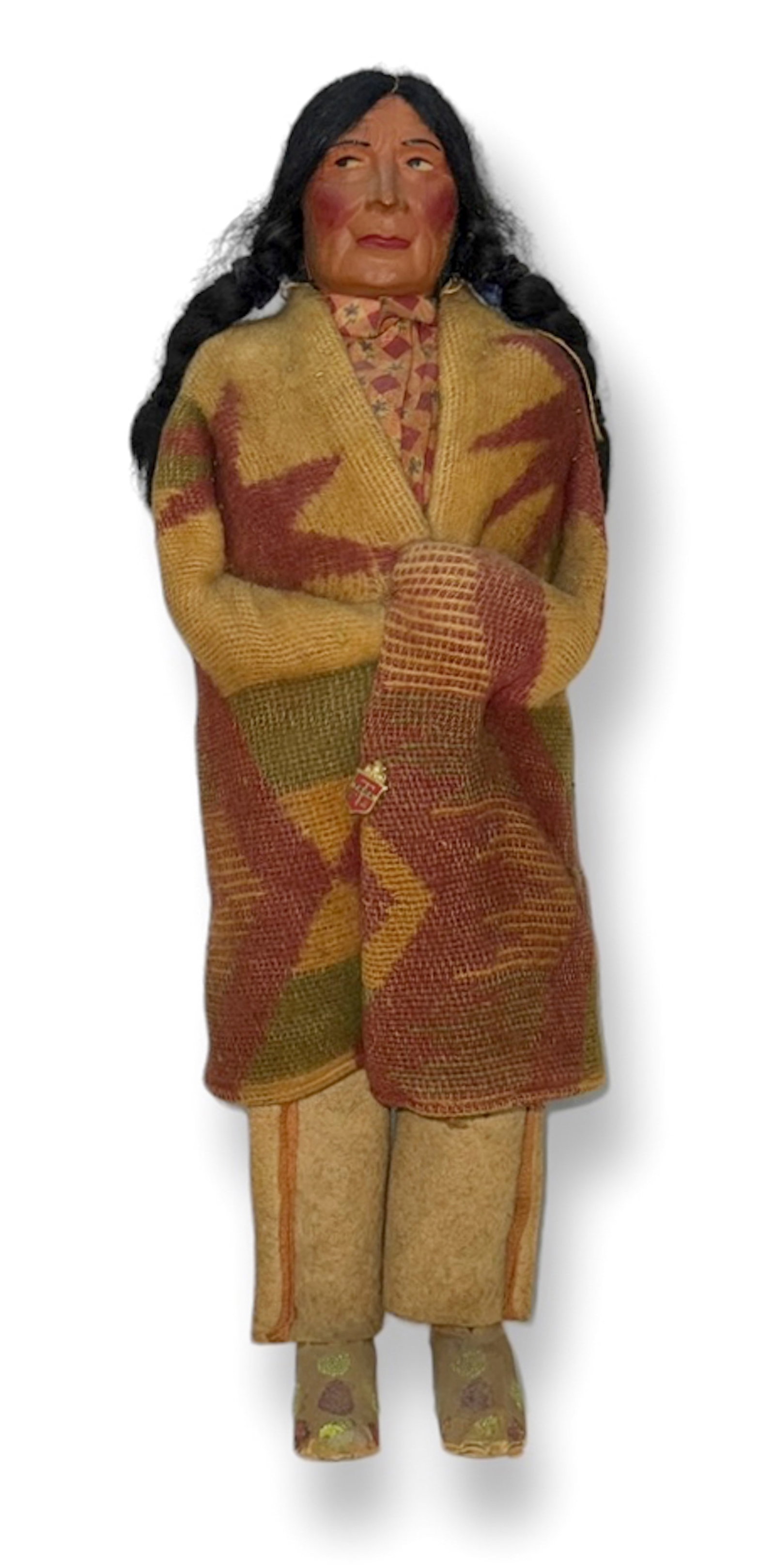 Antique Native American Skookum Doll 17 inches: Antique Native American Tall Male Skookum Doll. The Skookum doll is wrapped in a beacon blanket, hair is braided, has brownish felt legging and original suede shoes cover the legs. Dimensions: height: