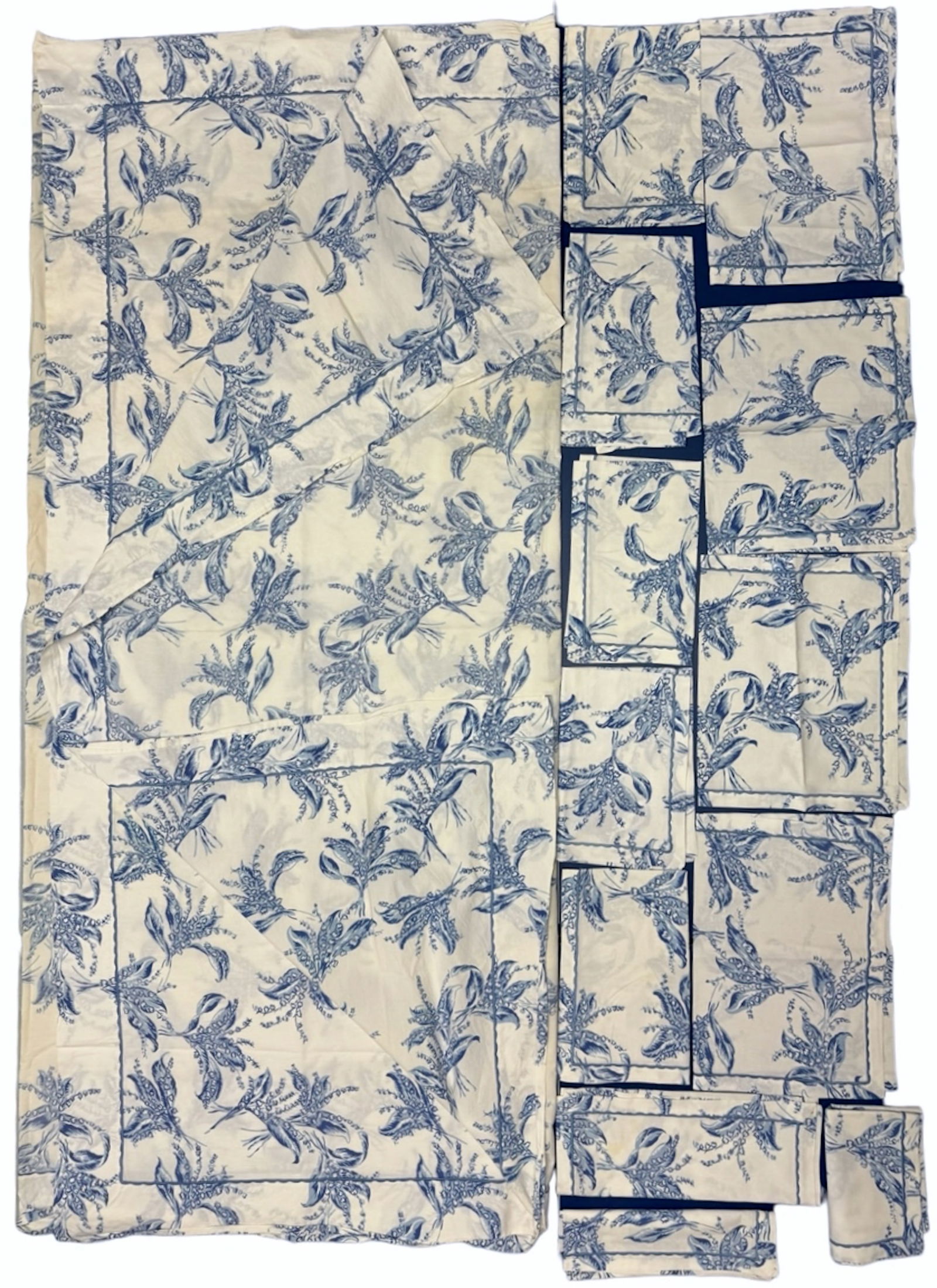 D. Porthault Tablecloth And Napkins In The Iconic Lily Of the Valley Pattern, France: Vintage French D. Porthault Lily Of The Valley-Muguet De Bois-cotton tablecloth and dinner napkins with hand printed Lily of the Valley Flowers in blue and white field. Large tablecloth with 12 large