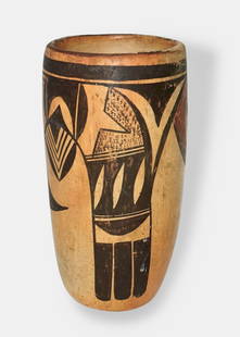 Hopi Polychrome Cylinder Vase c.1940s: Native American Indian Hopi Polychrome Cylinder Pottery Vase. Circa 1940s. Hand-crafted from native clay and mineral paint creating a Bird-Form-Design. Dimension: 7 in. hgt.; Rim Diameter: 3 3/8 in. C