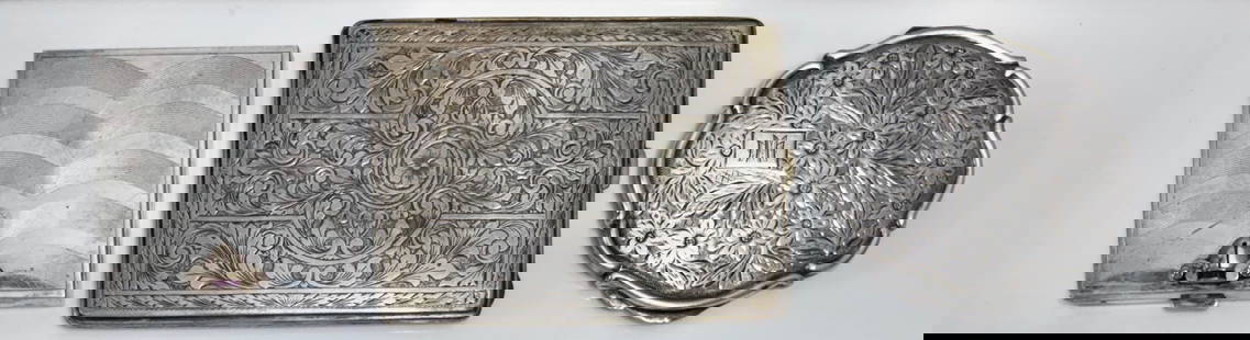 Antique Sterling Silver Cases: Antique assorted sterling silver cases. 1) Sterling ruby gem set powder compact (with powder). Weight: 96.3 gr. Marked Sterling. Dimensions: 2 1/2 inches x 2 1/2 inches. 2) Sterling mirror compact cas