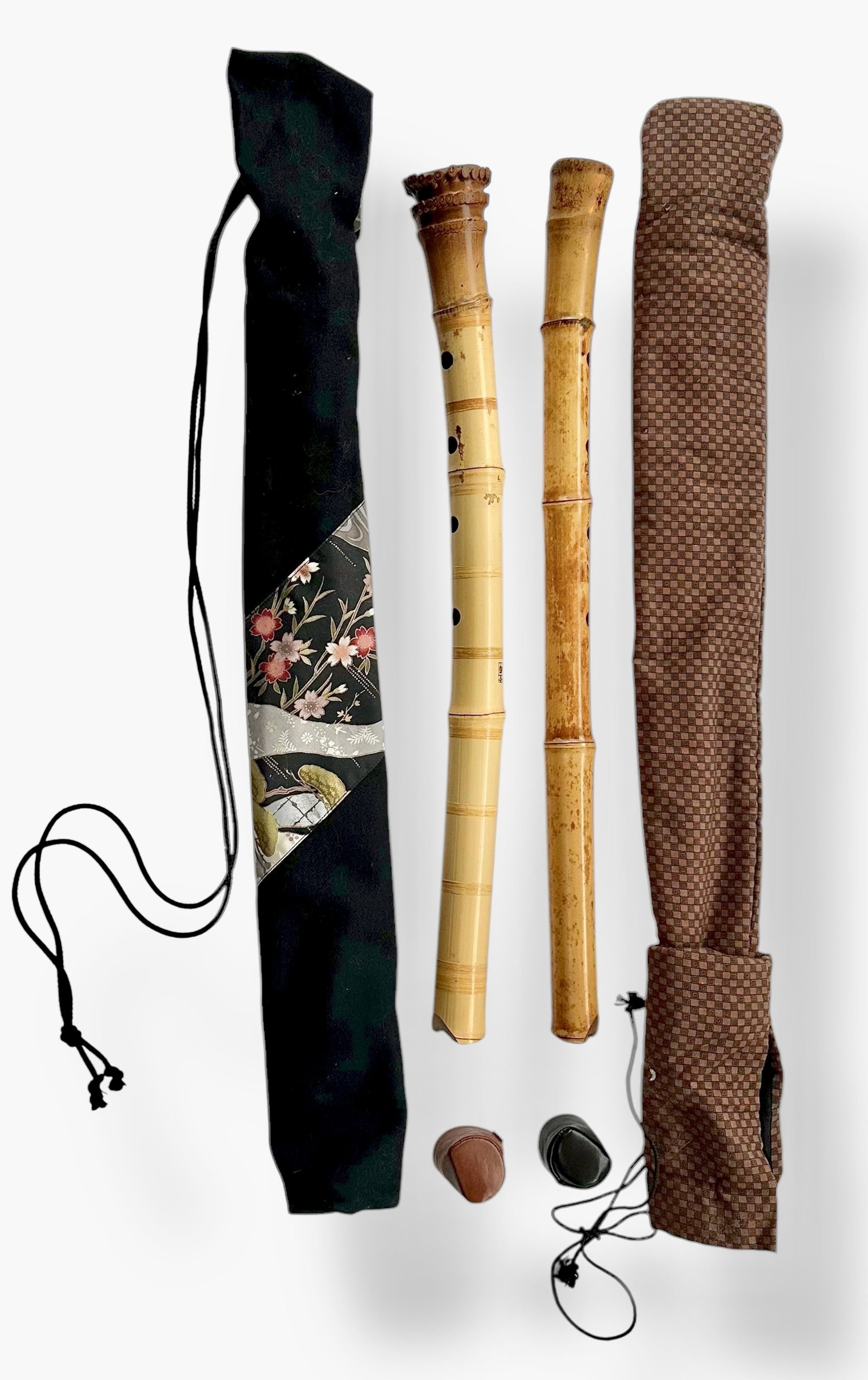 Japanese Bamboo Shakuhachi Flutes, Signed: Japanese Shakuhachi Bamboo Flutes with Brocade Cloth Covers. Two traditional bamboo flutes, one is signed (view photo). 1) Length: 21 3/4 inches. 2) Length: 22 1/4 inches. Condition: good original pre