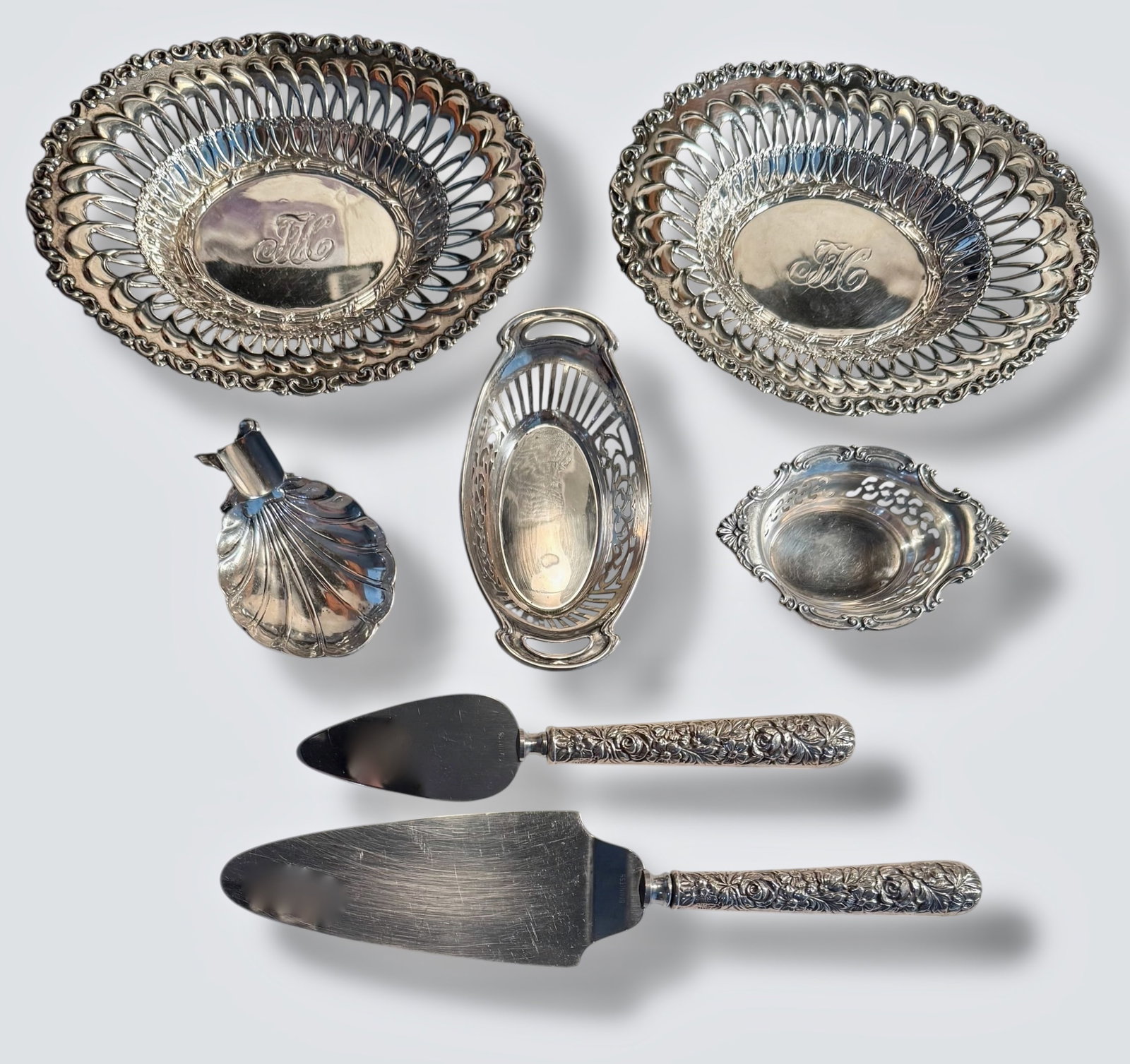 Estate Sterling Silver Assorted Tableware: A Collection of Antique Sterling Silver Tableware. Pair of Whiting Sterling Silver Louis XV Candy / Nut Bowl. Hallmark #3868. Center on each with monogram. Dimensions: 6 1/2 x 5 inches. Approximate we