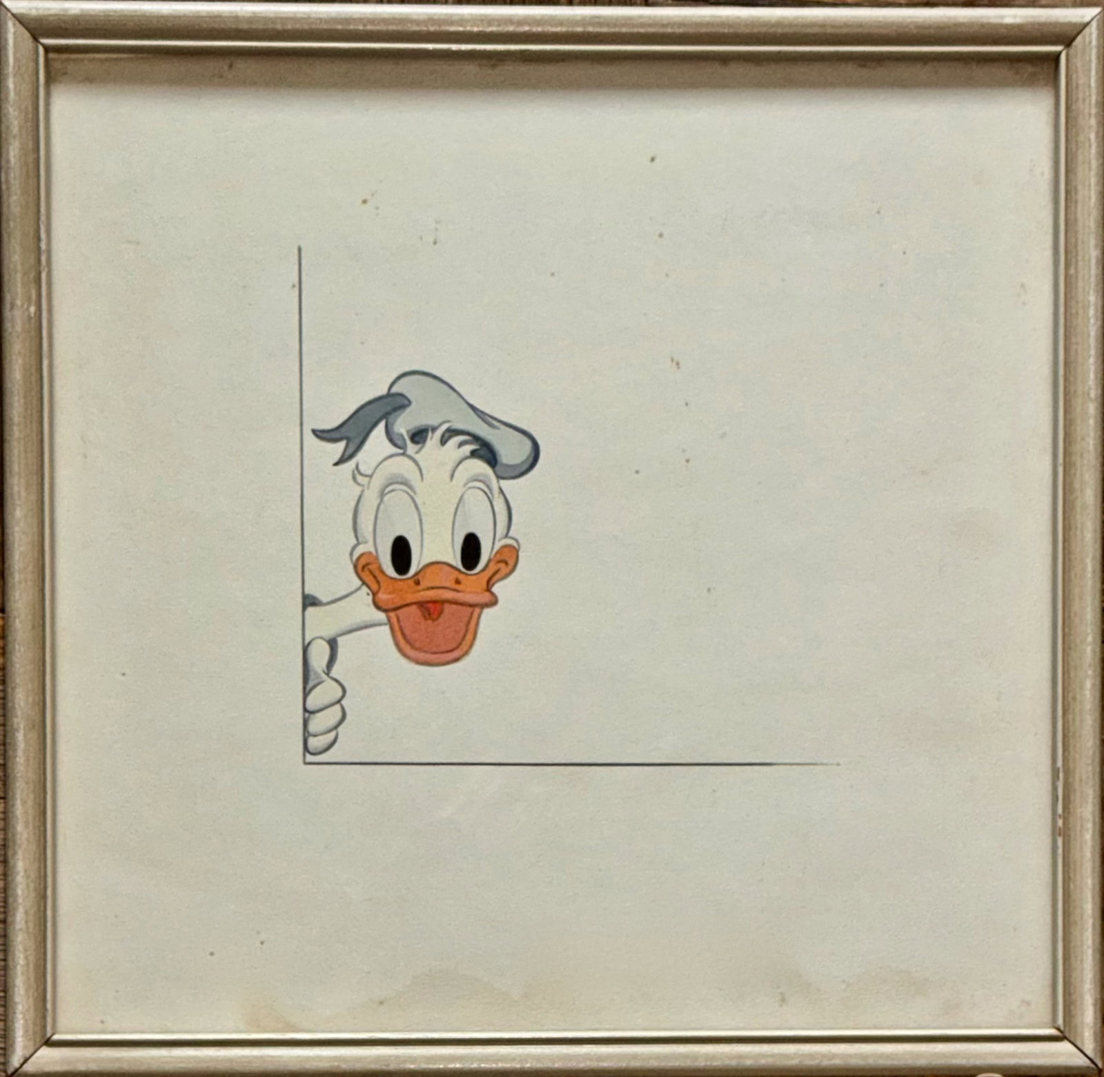 DISNEY Original Studio Drawing "DONALD DUCK", 1950s: Donald Duck Wearing Sailor's Cap. Original Disney Studio Artist Drawing "Donald Duck" 1950s. Ink and color on paper. Framed under glass. Dimensions: framed: 8 7/8 x 9 in., sight: 8 x 8 1/4 in. Conditi