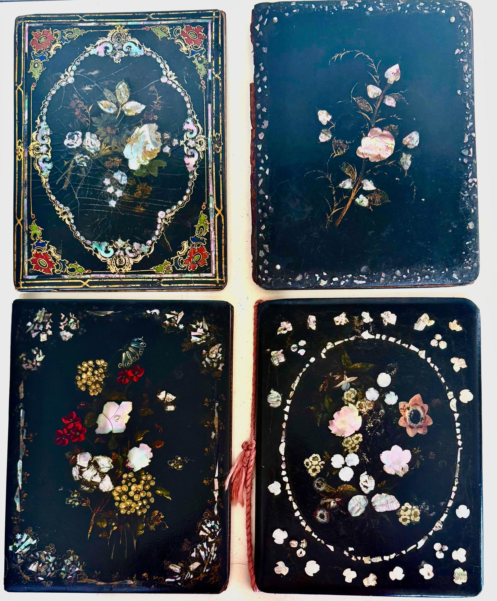 Antique Victorian Papier Mache Desk Blotter Folios w/ Floral Mother of Pearl Inlay (4): 19th Century Victorian Papier-Mache Desk Blotter Folios. Collection of four. Japanned lacquer finish with multi-colored hand-painted floral sprays and iridescent slices of shimmering shell. View all p