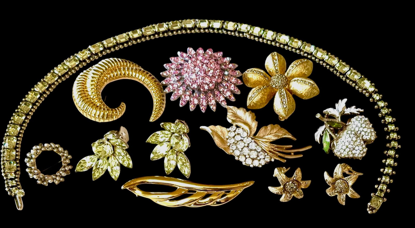 Art Deco To Hollywood Glamour, Vintage Costume Jewelry, Signed: Collection of vintage period signed costume jewelry. Designers: Benedikt, N.Y, Trifari, Kramer of New York, Monet and others. Crafted with opulent rhinestones, gold-plated, faux gemstones. pearls etc.