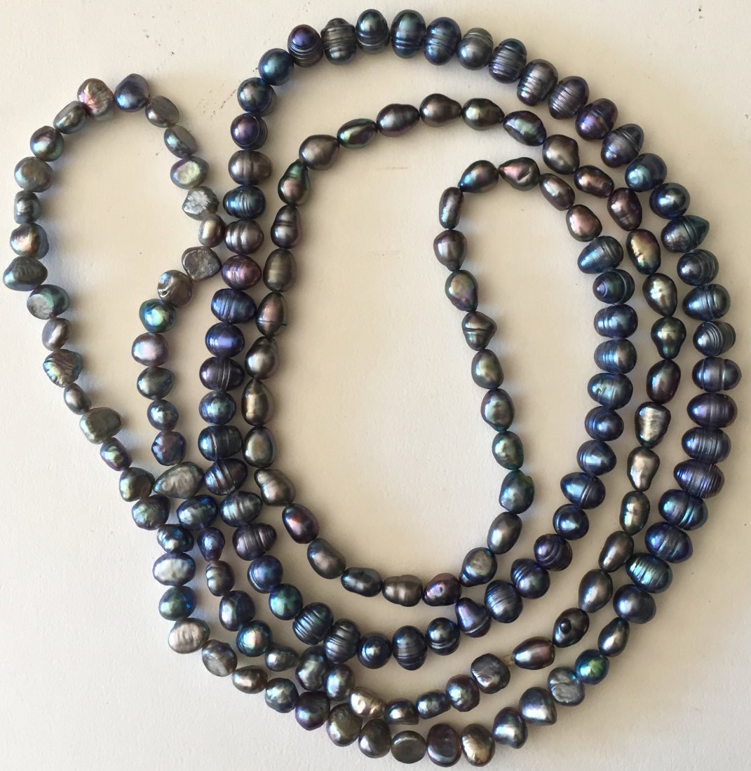 Tahitian Pearl Necklace, 46" lg.: Tahitian Pearl Necklace, 46"lg. South Sea black pearl necklace Dimension: 46" lg. Natural shades of color, semi-round to oval in shape Good estate condition Provenance: Bedford, New York Estate