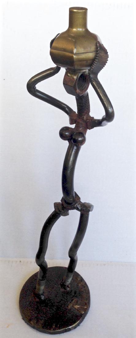 Nuts And Bolts Sculpture, Signed Russo: Nuts And Bolts Sculpture, Signed Russo Industrial modernist figural iron sculpture signed by the artist F. Russo (view photo) F. Russo (America, 20th century) Dimension: 17.25"hgt. Condition: Good est
