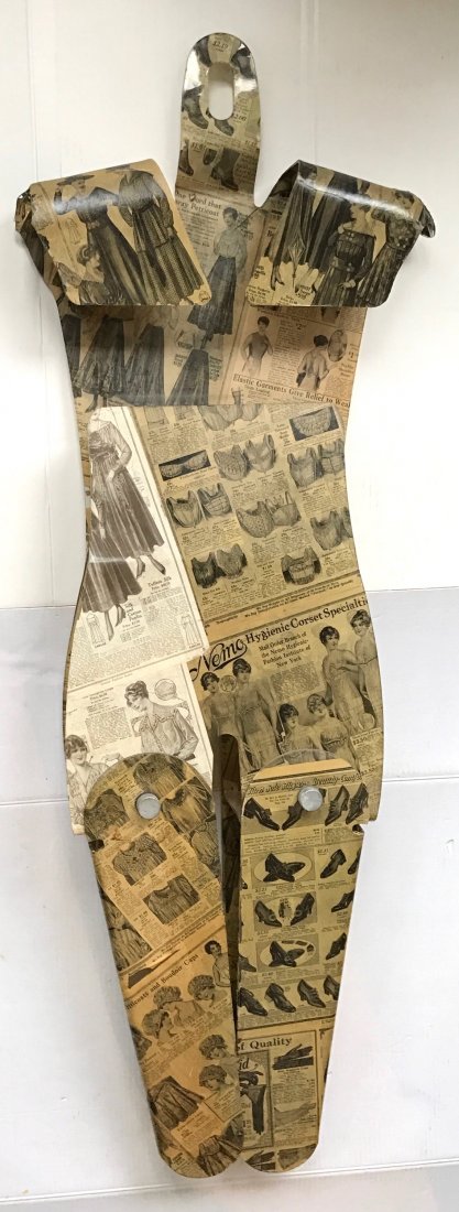 Modernist Free Form Wall Collage Sculpture, 4'4": Mid-century female collage sculpture, 53" lg. . Hard plastic modernist female free form sculpture connected with iron bolts to allow movement of legs. Collage of found fashion advertisements from the 