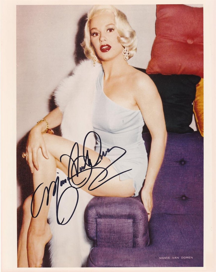 Mamie Van Doren-Signed Photograph: 8x10 Color glossy finish photograph signed in black felt tip ink by Mamie Van Doren. In excellent condition. Mamie Van Doren is an American actress, model, singer, and sex symbol. She is perhaps best 