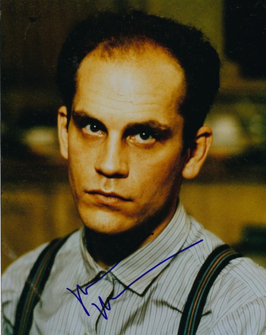 John Malkovich- Signed Color Photograph: 8x10 Color photograph signed with blue felt tip ink by John Malkovich. In very good condition. John Horatio Malkovich (born December 9, 1953) is an American actor, director, producer and fashion desig