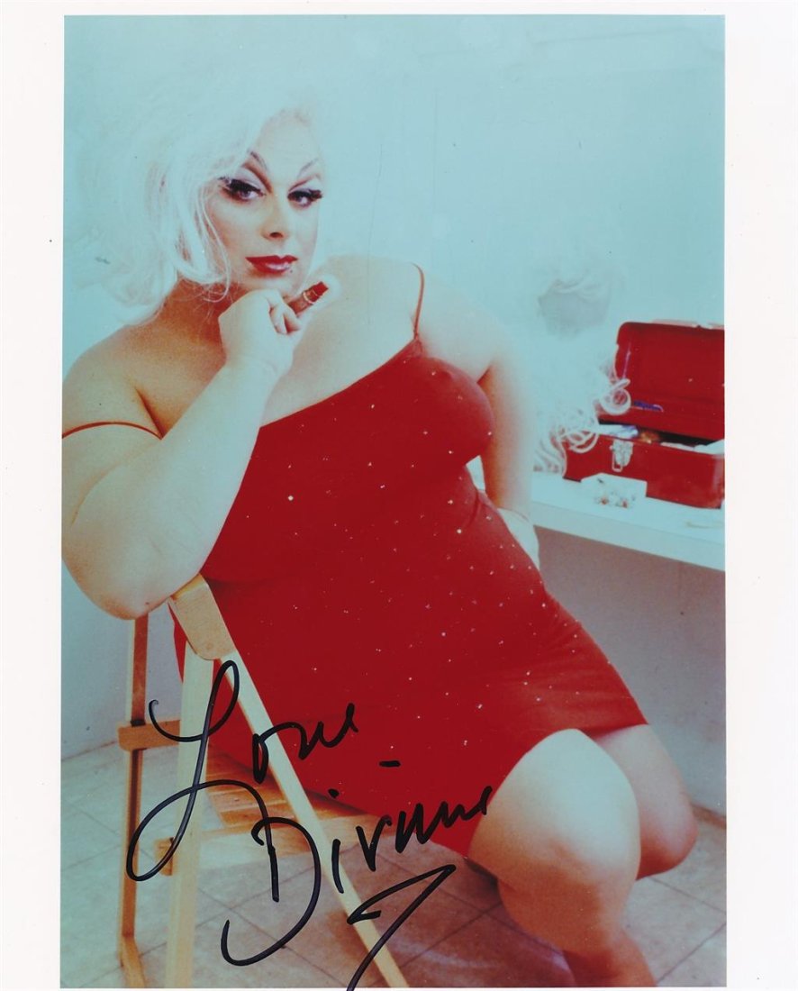 Divine- Signed Photograph (Famous Actor/Drag Queen): 8X10 Color glossy finish vintage photograph signed in black felt tip ink, "Love Divine." In very good condition. (1945â€“1988) Harris Glenn Milstead was better known by his stage name Divine. He 