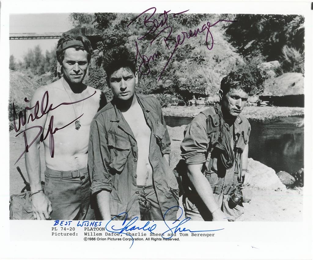 Platoon-Vintage Signed Photo by 3 Cast Members: 10X8 B&W Glossy vintage photograph of the main cast from, "Platoon." Hand signed by Willem Dafoe, Charlie Sheen and Tom Berenger. In excellent condition.Comes with a Letter of Authenticity from www.To