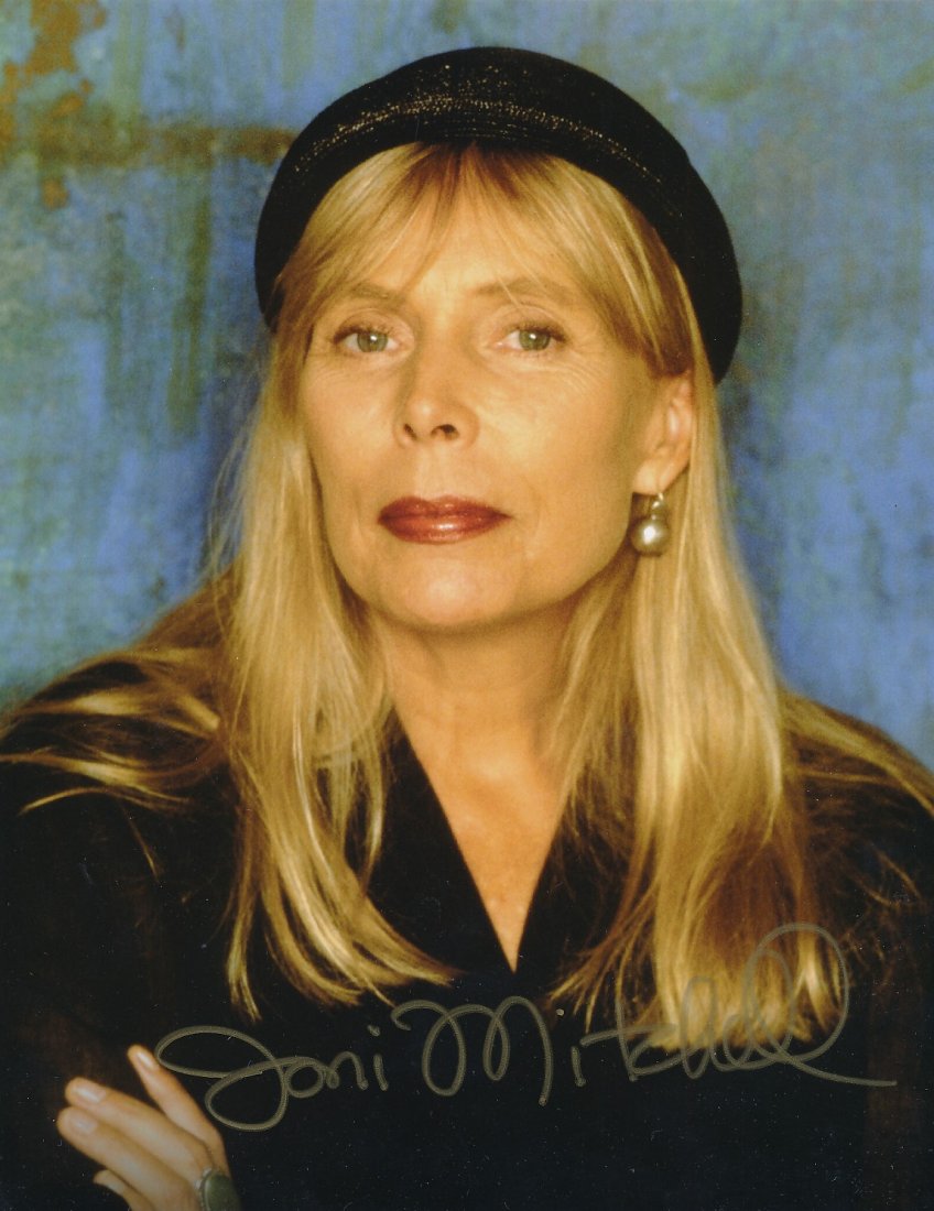 Joni Mitchell-Signed Photograph: 8x10 Color satin finish photograph signed in gold ink by Joni Mitchell. Excellent condition. Comes with a full Letter of Authenticity from Todd Mueller Authentics.