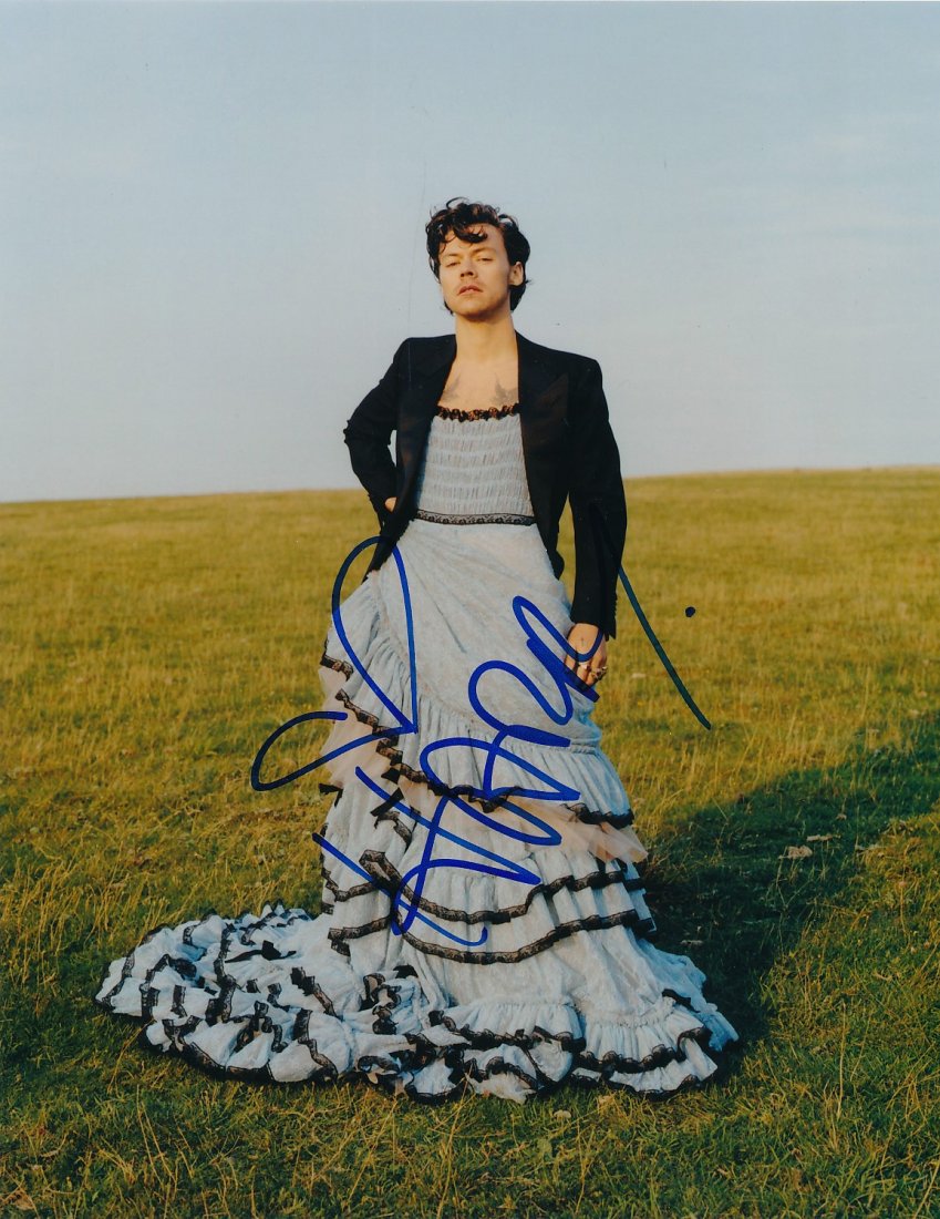 Harry Styles-Signed Photograph: 8x10 Color satin finish photograph signed in blue felt tip ink by Harry Styles. Excellent condition. Comes with a full Letter of Authenticity from Todd Mueller Authentics.
