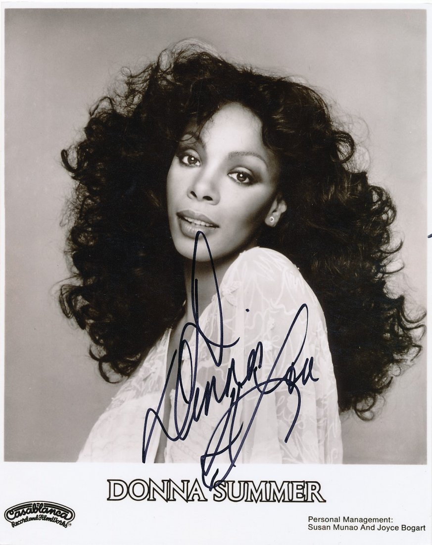Donna Summer-Signed Photograph from Casablanca Records: 8x10 B&W satin finish photograph signed in black felt tip ink by Donna Summer. Excellent condition. This photograph comes from her management photos at Casablanca Records. Comes with a full Letter of 