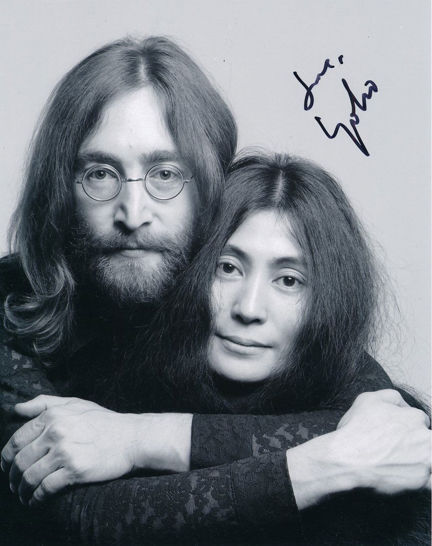 Yoko Ono-Signed Photograph with John Lennon: 8x10 B&W satin finish photograph of John Lennon and Yoko Ono. Signed in black felt tip ink by Yoko Ono. Excellent condition. Comes with a full Letter of Authenticity from Todd Mueller Authentics.
