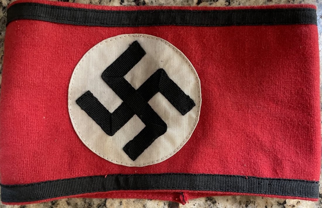 NAZI- Original Hand Sewn Arm Band -Worn: Historical original used Nazi Arm band once worn by someone in the German Nazi leadership. Unknown who wore this but it's original and hand sewn, unlike the replicas. In very good condition.It measure