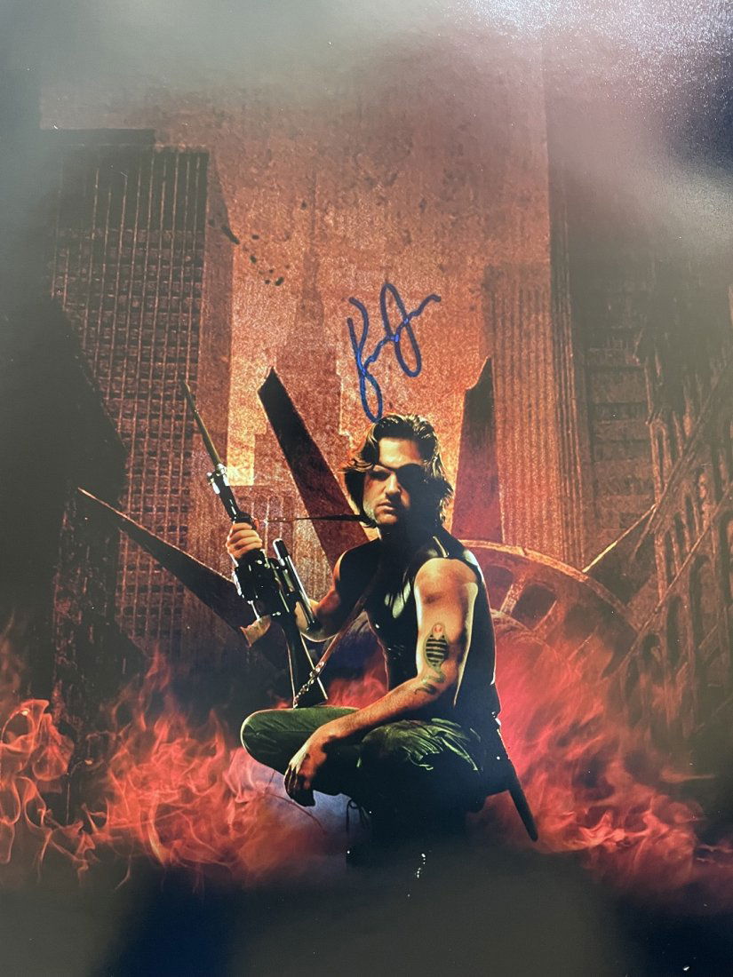 Kurt Russell-Signed 16x10 Photograph "Escape from New York": 16x20 Color photograph from "Escape from New York" and signed in felt tip ink by Kurt Russell. Some minor creases along the upper portion, otherwise, in good condition.This would look perfect matted a