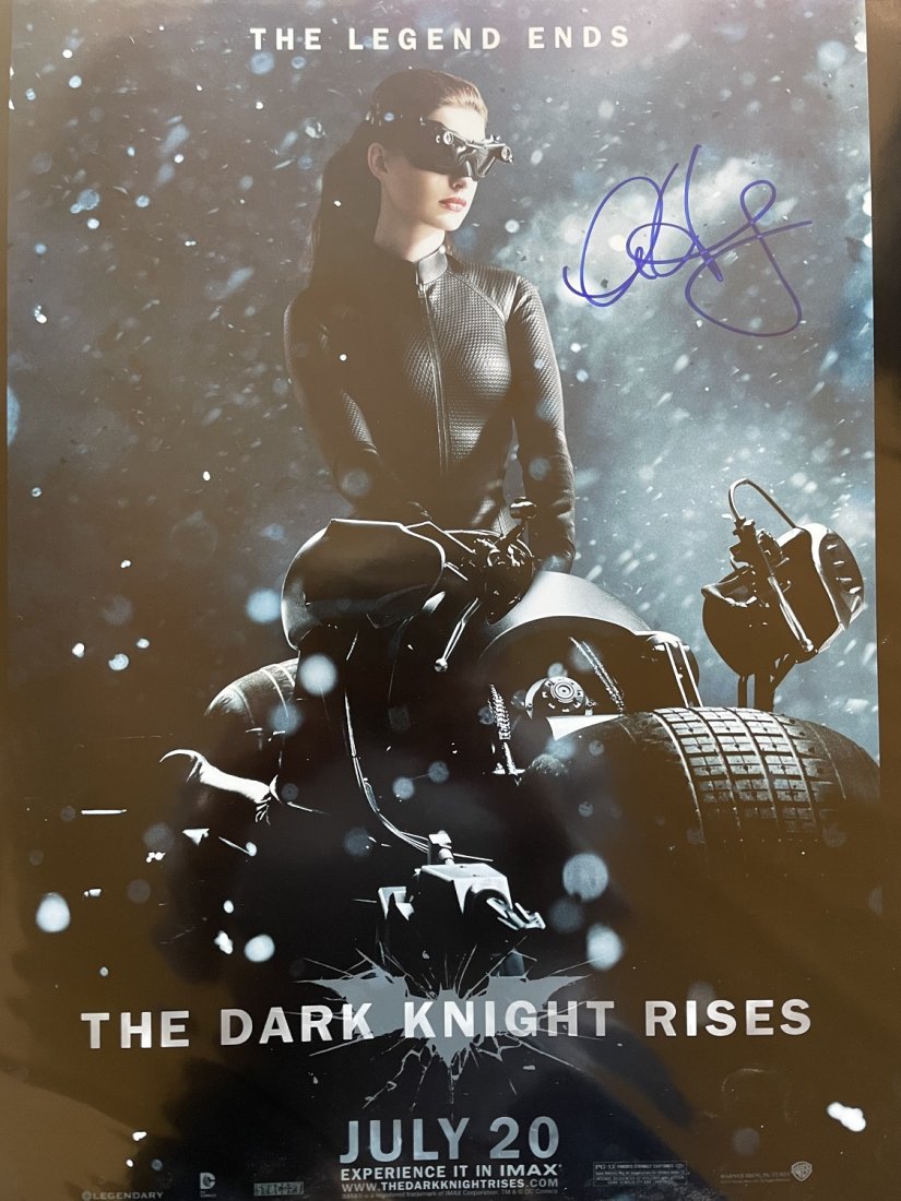 Anne Hathaway-Signed 16x20 Photograph "The Dark Knight Rises": 16x20 Color photograph from "The Dark Knight Rises" and signed in felt tip ink by Anne Hathaway. In very good condition.This would look perfect matted and framed. Comes with a full Letter of Authentic