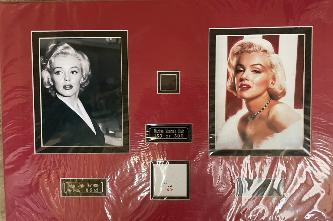 Marilyn Monroe- Strand of her Hair Matted Nicely: Limited Edition 153 of 300 24X16 matted ensemble featuring a strand of Marilyn Monroe's hair matted with two photographs of her and three name plates. Comes with a COA by John Reznikoff.