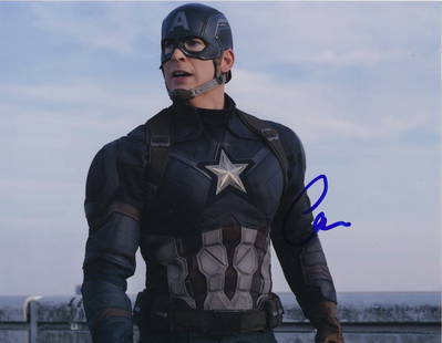 Chris Evans-Signed "Captain America" Photograph: 10x8 Color satin finish photograph from a Marvel film featuring "Captain America" and signed by Chris Evans in blue felt tip ink. Excellent condition. Comes with a full Letter of Authenticity from