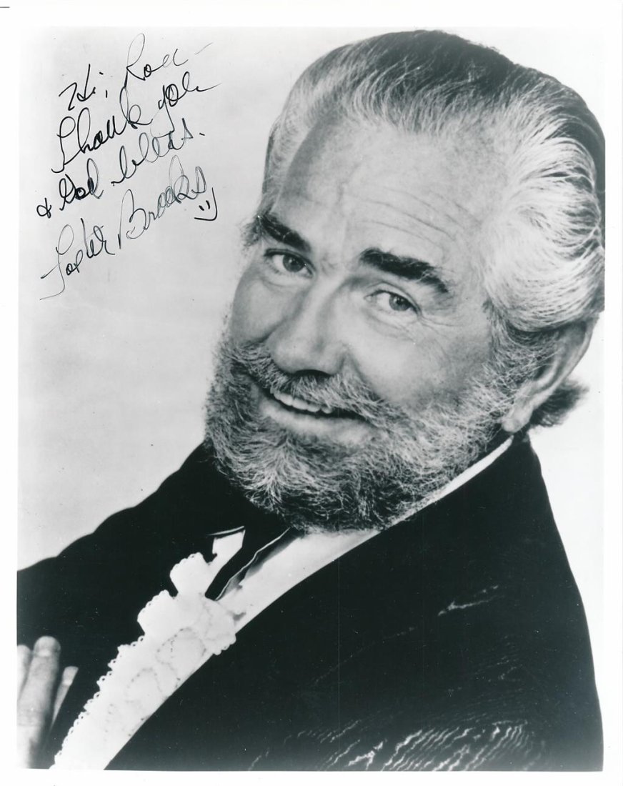 Foster Brooks- Signed Photograph: 8X10 B&W Glossy photograph signed in black felt tip ink, "Hi, Ron thank you & God Bless, Foster Brooks." In very good condition.(1912â€“2001) Foster Brooks was an American actor and comedian best