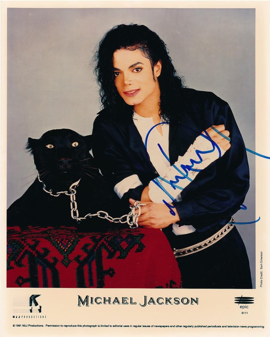 Michael Jackson- Color Signed Epic Label Photograph: 8X10 Color Glossy Epic Record Label photograph signed in blue felt tip ink nicely by Michael Jackson. In excellent condition.Comes with a full Letter of Authenticity from Todd Mueller Authentics.