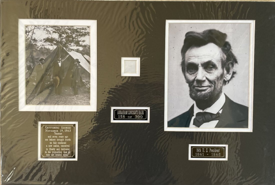 Abraham Lincoln- Strand of his Hair Matted: Limited Edition 158 of 300. Strand of Abraham Lincoln's hair matted with two photographs, three nameplates to an overall size of 24X16. Comes with a COA from John Reznikoff.