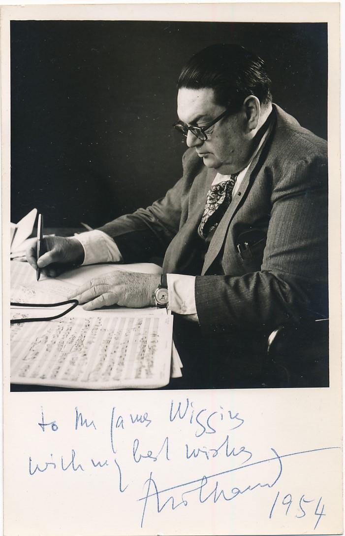 Darius Milhaud -Signed Postcard in 1954 (French Composer): Vintage 3.5X5.5 picture postcard signed in the lower margin in ballpoint ink, "To Mr. James Wiggins with my best wishes, Milhaud, 1954." In excellent condition.(1892-1974) Darius Milhaud was a French 