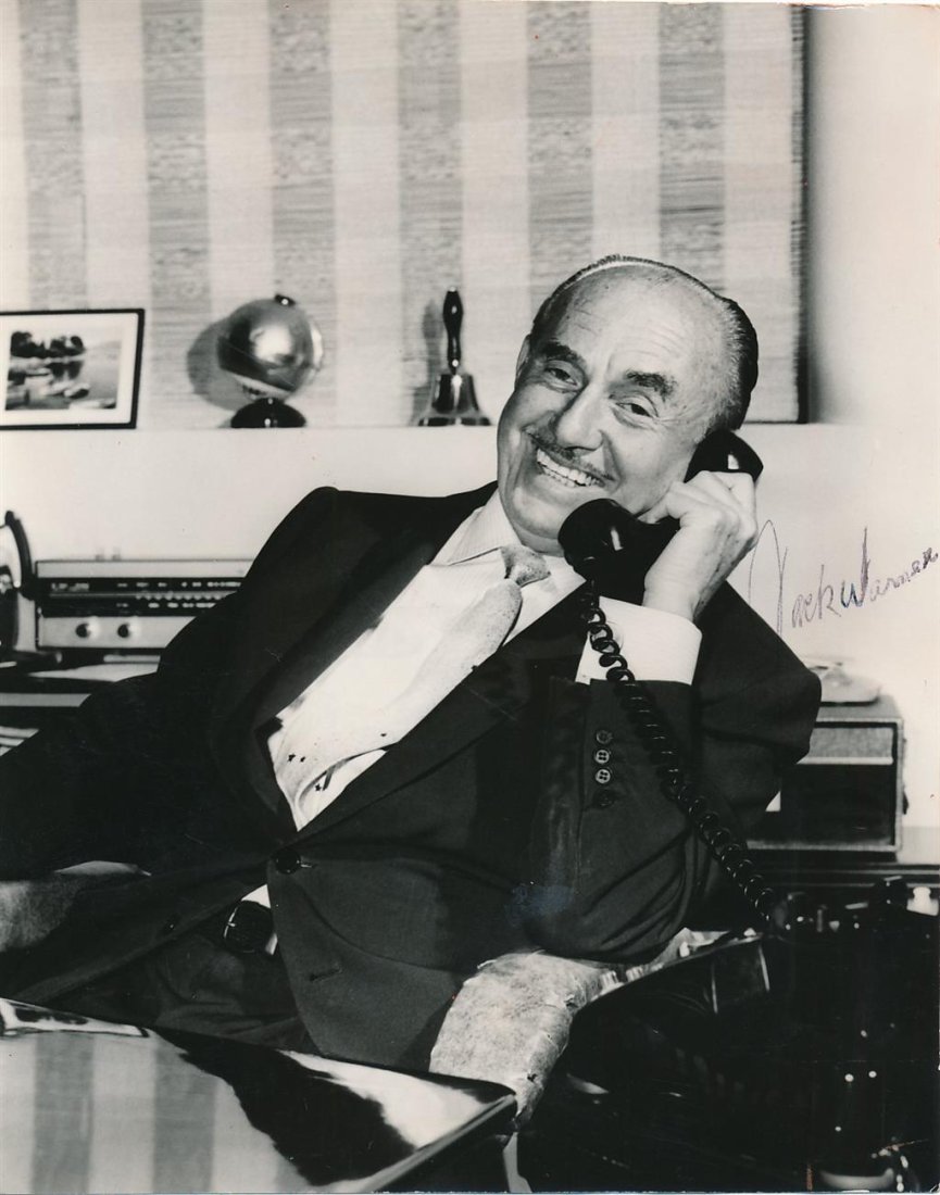 Jack L. Warner- Vintage Signed Photograph (Warner Bros. Mogul): 7.5X9 Vintage B&W photograph signed in black ballpoint ink by Jack L. Warner. Wavyness and minor creasing, otherwise in very good condition. (1892-1978) Jack Leonard Warner was a Canadian-American fil