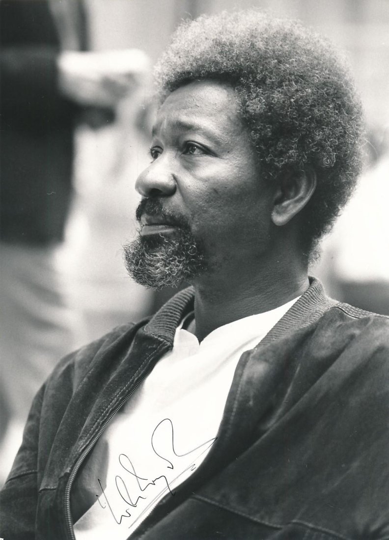 Wole Soyinka-Signed Vintage Photograph (Nobel Prize 1986): 7x9.5 B&W glossy vintage photograph signed by Wole Soyinka in black ink. Scattered creasing, otherwise, nice.Wole Soyinka is a Nigerian playwright, novelist, poet, and essayist in the English language