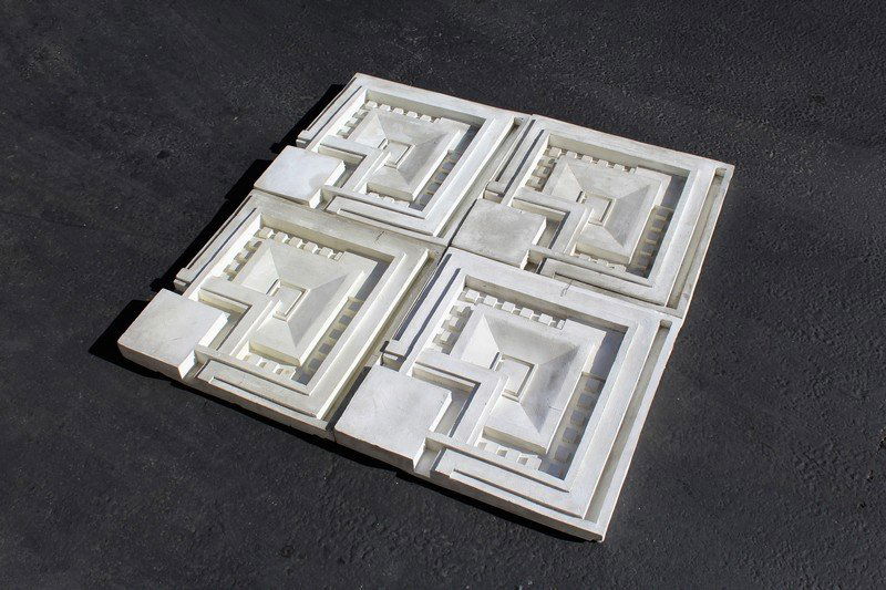 Wall Panels (4): A set of four wall panels in the style of Frank Lloyd Wright. Copied from Ennis house in L.A. Hand lay up fiberglass with white gel coat. 21-1/2 inches by 21-1/2 inches and 2 inches deep. Made in the
