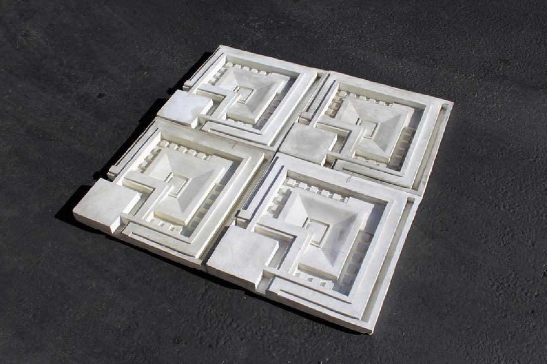 Wall Panels (4): A set of four wall panels in the style of Frank Lloyd Wright. Copied from Ennis house in L.A. Hand lay up fiberglass with white gel coat. 21-1/2 inches by 21-1/2 inches and 2 inches deep. Made in the
