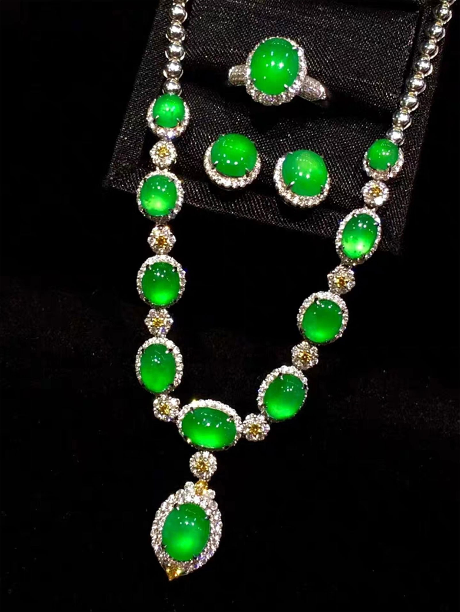 A Set of Chinese Carved Jadeite Necklace, Earring, and (1 of 3)