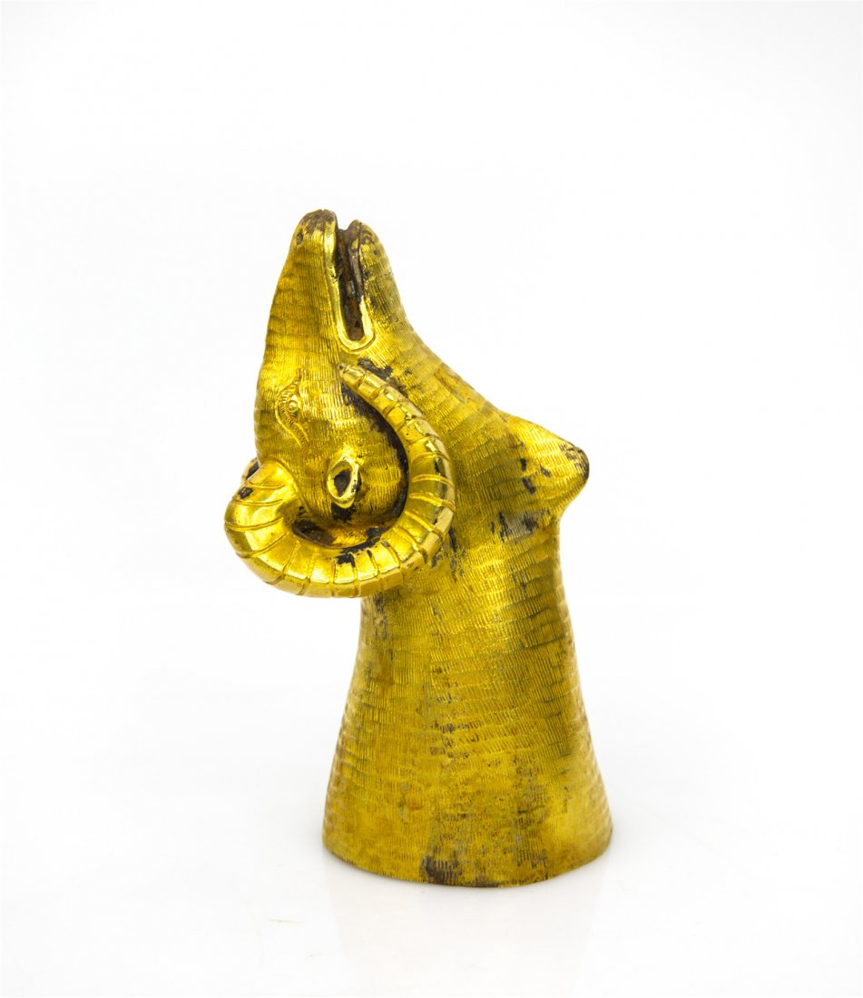 A CHINESE GILT BRONZE RAMS HEAD FINIAL (1 of 5)