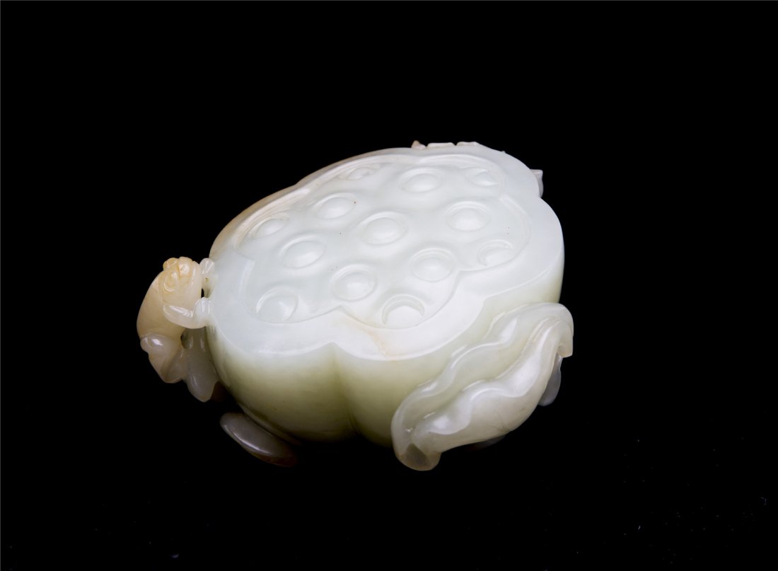 A CELADON JADE CARVING (1 of 4)