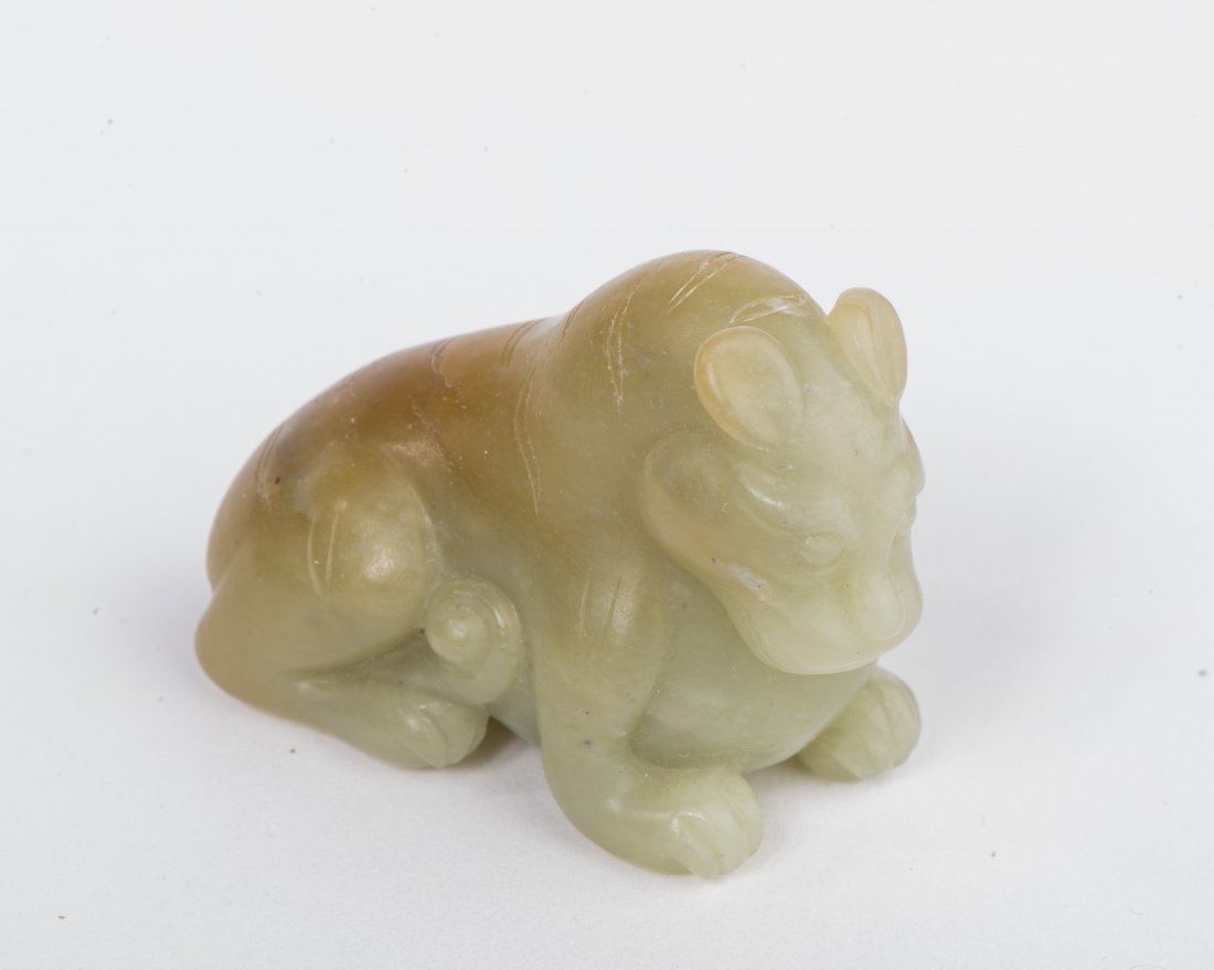 A CELADON JADE CARVING (1 of 5)