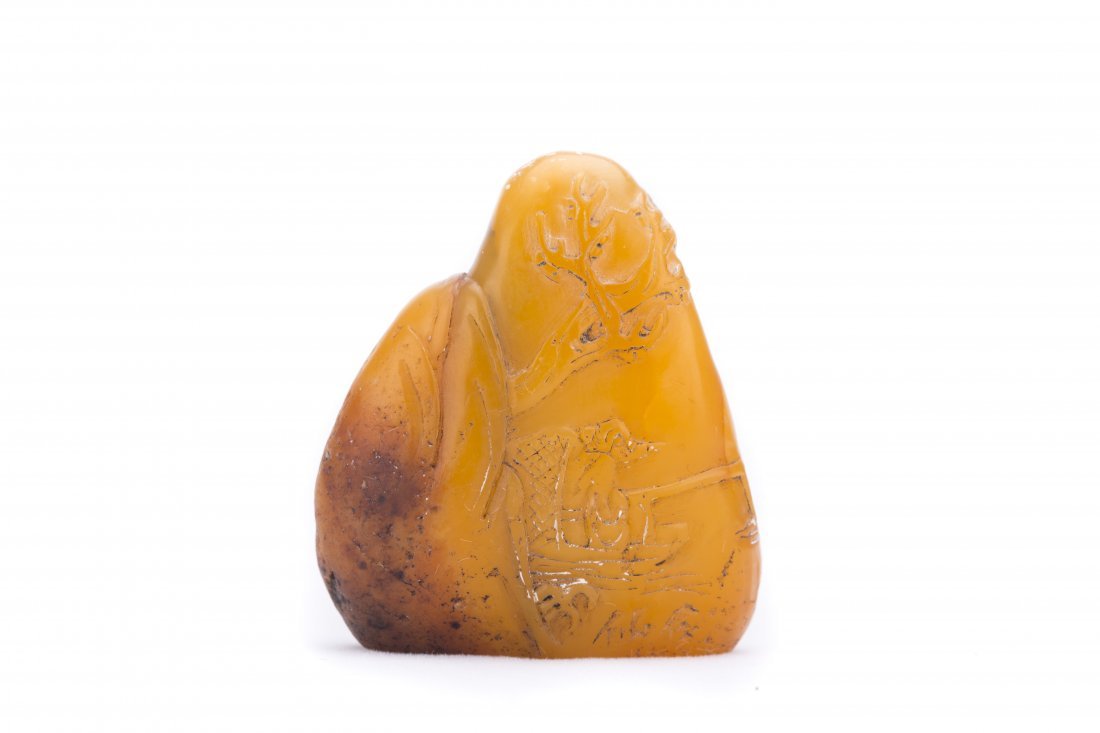 A SOAPSTONE CARVING : A Soapstone Carving Lg. 1 5/16 In. Diam. 1 3/4 In.