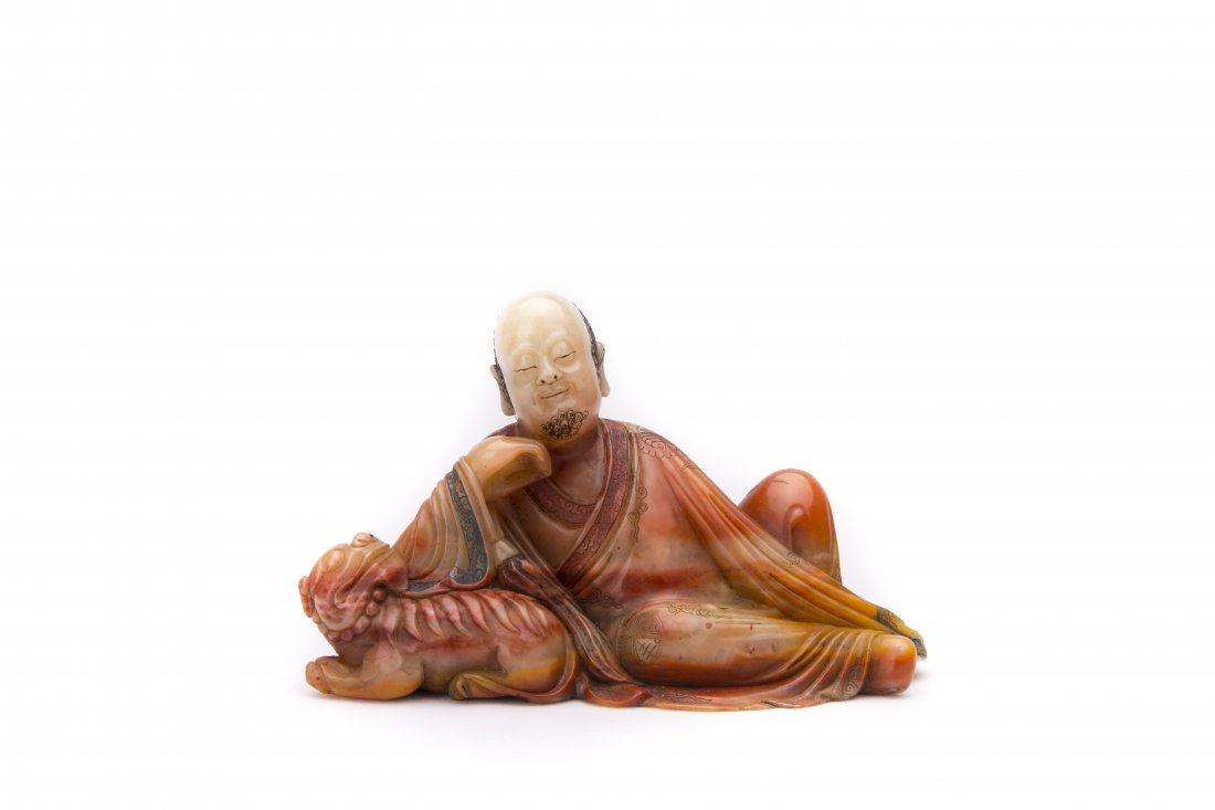 A SOAPSTONE FIGURE (1 of 4)