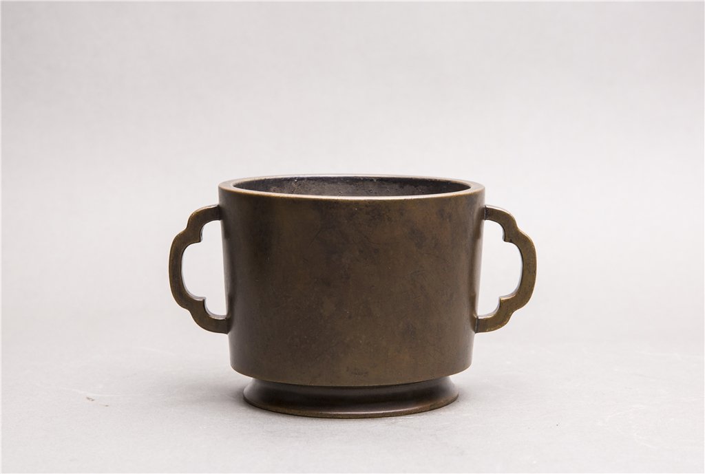 A BRONZE TWO-HANDLED CENSER (1 of 5)